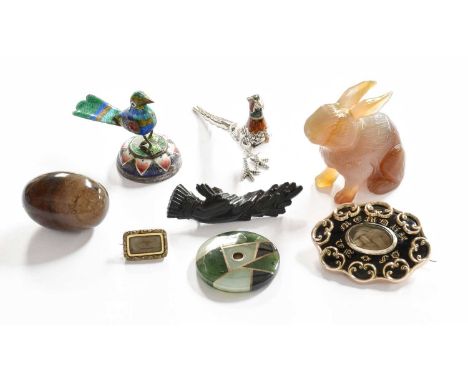 A Silver and Enamel Model of a Pheasant, a similar Indian model of a bird, a carved jade model of a hare, an agate egg, a nep