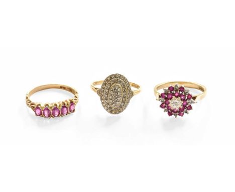 Three 9 Carat Gold Gem-Set Rings, including a diamond cluster example, finger size O; and two synthetic ruby examples, finger