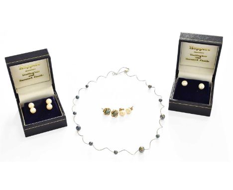 An 18 Carat White Gold Cultured Pearl Necklace, length 43.5cm; together with Four Pairs of Cultured Pearl Earrings, with post