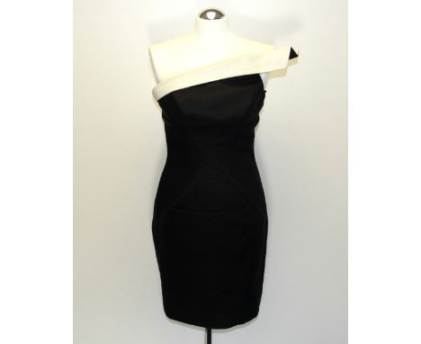 Alexander Van Baalen, two sample dresses, a strapless black and white corseted dress (38/34/45cm) and a black and white corse