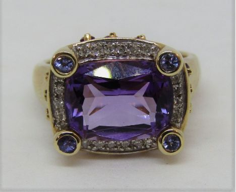 9ct geometric dress ring set with an amethyst within diamond surround, with further pink and violet stones, size O, 5.7g