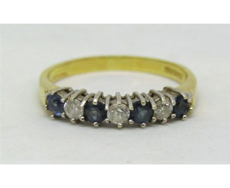 18ct seven stone ring set with alternating sapphires and diamonds, size M/N, 2.5g