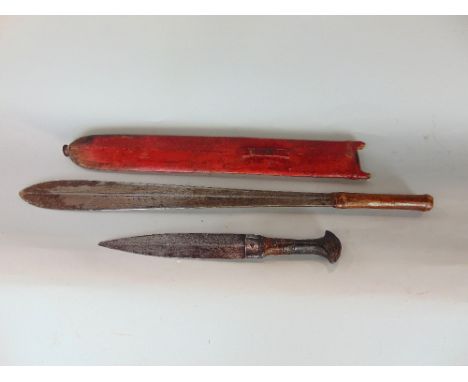 An eastern knife (probably fashioned from an earlier spear head) in a red leather scabbard and one other smaller example