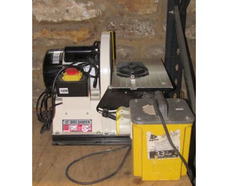 An Axminster workshop bench top 12 inch disc sander, model number 340295 together with a 10 volt power tool transformer seria