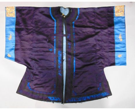 Early 20th century oriental silk kimono from China or South East Asia; colour is rich indigo with blue cuffs, with goldwork b