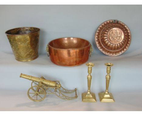 A mixed metalware lot to include a copper jardiniere with twin brass lion head ring handles, together with a further bucket s