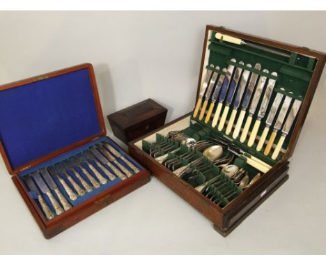 Oak part fitted canteen of cutlery with various old English flatware and bone handled knives, together with a further mahogan