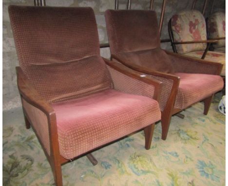 A pair of vintage teak framed drawing room chairs, with original fabric