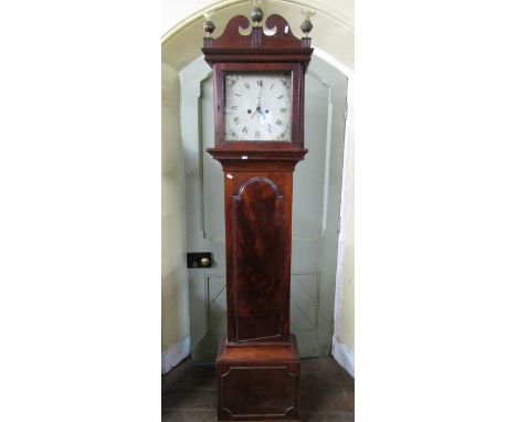 A Georgian mahogany longcase clock, the square cut hood enclosing a painted dial with subsidiary calendar and secondary dials