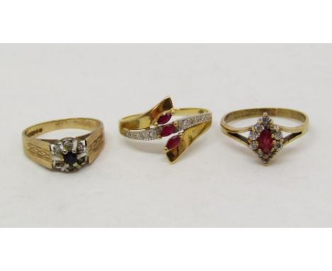 Group of three gold rings comprising a stylised 18ct pink spinel and diamond crossover ring together with two 9ct examples; o