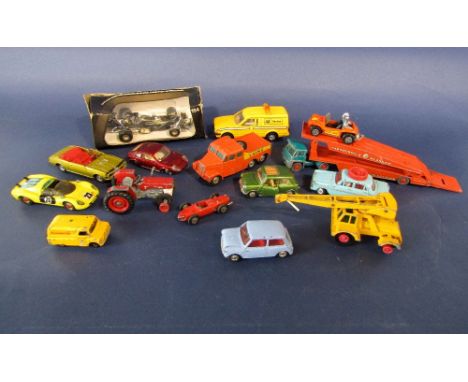 A collection of unboxed diecast toys including Corgi cars; Mini Marcos GT850, Chevrolet Camaro, Morris Mini Minor, Mini Coope