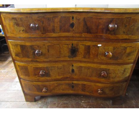 18th century walnut inverted serpentine commode of four long drawers, with cross banded detail, raised on bracket supports, 1