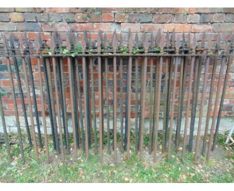 A run (4 sections) of heavy 19th century iron railing, with vertical bars and arrow head finials, varying in length (af), 22f