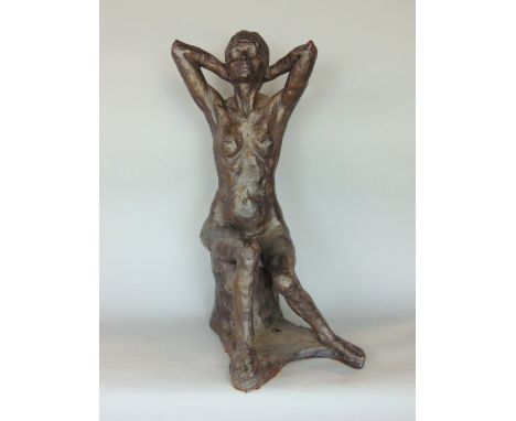 Cold cast resin sculpture of a seat nude female, 45cm high