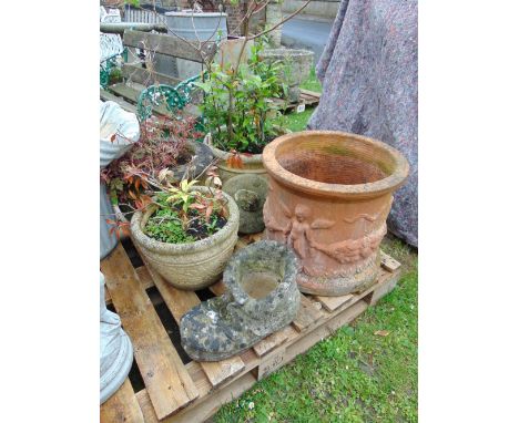 Four weathered contemporary cast composition stone planters of varying design, a novelty ornament in the form of a toadstool 