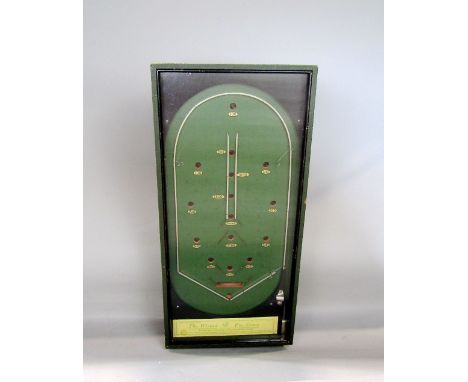 Vintage bagatelle type game 'The Wizard Pin Game' with boxed mechanism covered by clear glass top, 65 x 31 x 15 cm