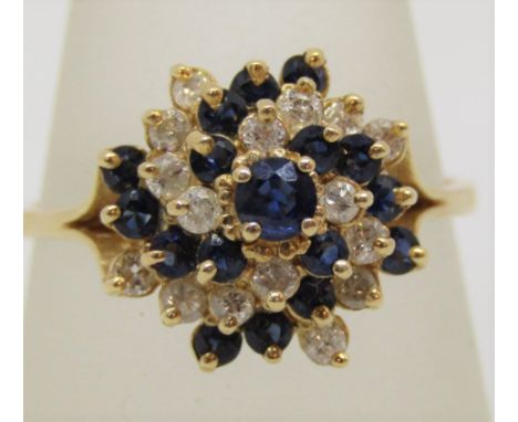 Stylised 14k sapphire and diamond cluster ring, size U/V, 4.6g