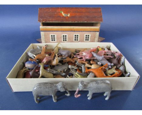 Vintage wooden Noah's Ark, 36 cm long with painted exterior and a large number of assorted pairs of carved wooden animals and