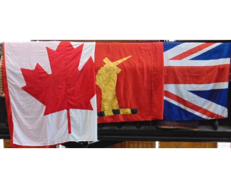 A collection of vintage/antique ships flags to include a large Union Jack, Canadian flag, Morocco, Greece, Pakistan and one o