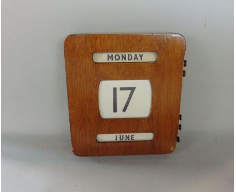 Vintage oak cased perpetual date calendar, with day, date and month, 31cm high