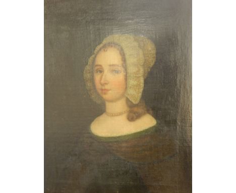 18th/19thC English School. Head and shoulders portrait of a lady wearing a lace bonnet, oil on canvas, in original frame, 74.