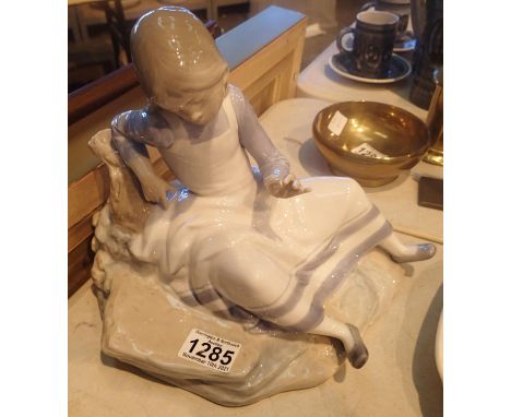 Large Nao figurine of a seated girl, H: 25 cm. Not available for in-house P&amp;P, contact Paul O'Hea at Mailboxes on 01925 6