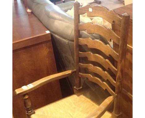 Large antique oak ladder back carver chair with rush seat, H: 110 cm. Not available for in-house P&amp;P, contact Paul O'Hea 