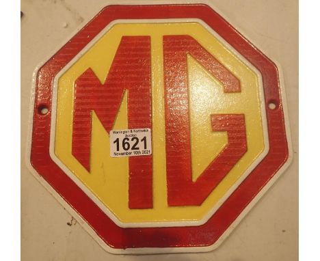 Cast iron MG wall sign, L: 24 cm. P&amp;P Group 1 (£14+VAT for the first lot and £1+VAT for subsequent lots) 