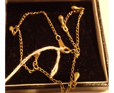 Turkish yellow metal ankle chain, 2.7g. L: 24 cm. P&amp;P Group 1 (£14+VAT for the first lot and £1+VAT for subsequent lots) 