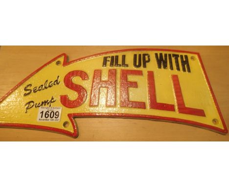 Cast iron Fill Up With Shell Oil shop sign, L: 40 cm. P&amp;P Group 2 (£18+VAT for the first lot and £3+VAT for subsequent lo