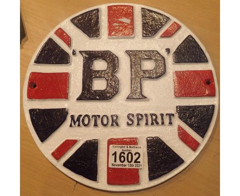 Cast iron BP MotorSport sign, D: 25 cm. P&amp;P Group 1 (£14+VAT for the first lot and £1+VAT for subsequent lots) 