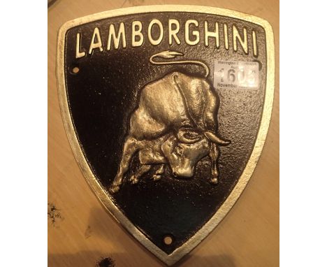 Cast iron Lamborghini plaque sign, L: 22 cm. P&amp;P Group 1 (£14+VAT for the first lot and £1+VAT for subsequent lots) 