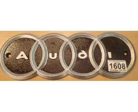 Cast iron Audi wall shop sign, L: 28 cm. P&amp;P Group 1 (£14+VAT for the first lot and £1+VAT for subsequent lots) 