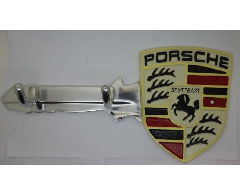 Cast iron Porsche key wall coat hanger, L: 30 cm. P&amp;P Group 2 (£18+VAT for the first lot and £3+VAT for subsequent lots) 