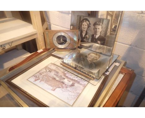 Mixed framed pictures and prints, three glass photograph frames, a wall hanging mirror and a Metamec mantel clock etc. Not av