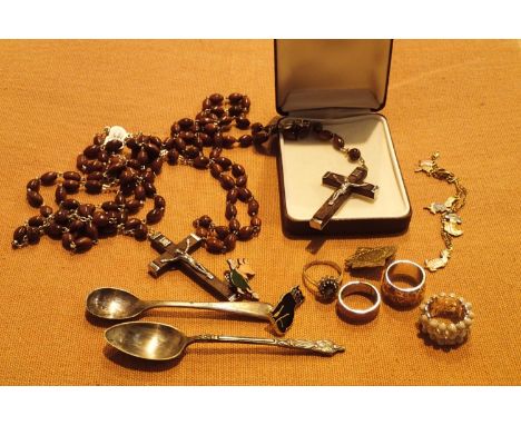 Mixed collectables including salt spoon, Peter Rabbit bracelet, Rosary beads, crucifix necklaces etc. P&amp;P Group 1 (£14+VA