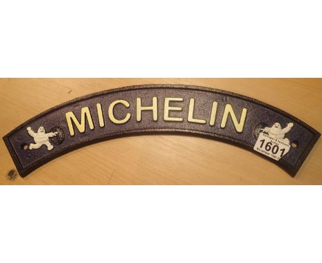 Cast iron Michelin Banner wall sign, L: 40 cm. P&amp;P Group 2 (£18+VAT for the first lot and £3+VAT for subsequent lots) 