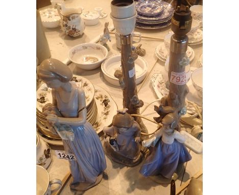 Nao figural table lamp, H: 37 cm, a further Nao lamp (damaged, glued) and a Nao girl figurine (damaged). Not available for in