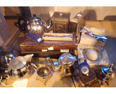 Mixed metalware including cased flatware, miniature silver plated tea set, brass Coronation tea caddy etc. Not available for 