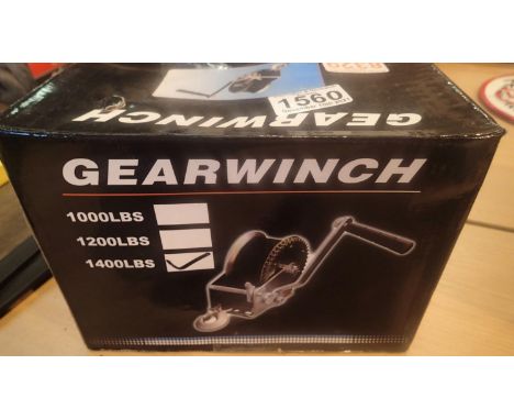 A boxed 1400lbs manual gear winch. Not available for in-house P&amp;P, contact Paul O'Hea at Mailboxes on 01925 659133 