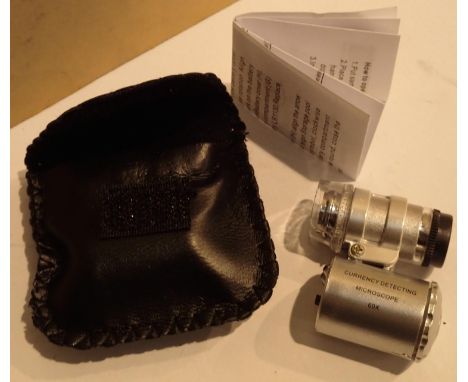 Leatherette cased 60x jewellery detaching loupe with LED. P&amp;P Group 1 (£14+VAT for the first lot and £1+VAT for subsequen