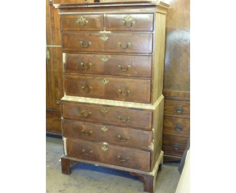 An early 18th Century walnut Chest on Chest in a state of half restoration, cavetto style cornice above two half width and si