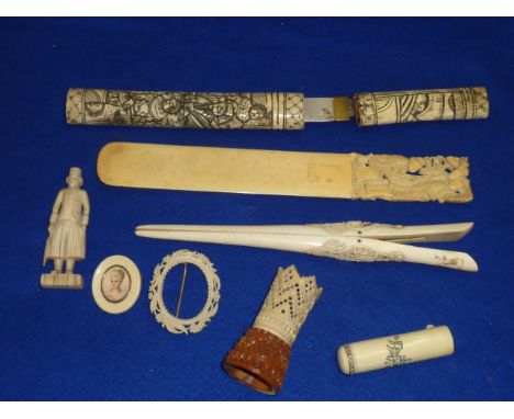 An interesting selection of 19th Century Ivory (including Oriental) comprising a Page Turner very finely decorated with figur