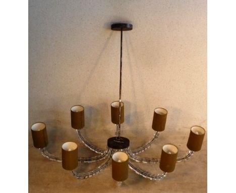 A modern designer eight branch hanging Ceiling Light by Porta Romana,, the branches as revolving clear glass squares, the met