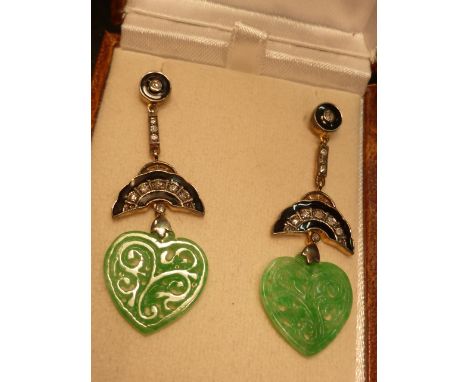 A pair of carved jade enamel and diamond drop Earrings 