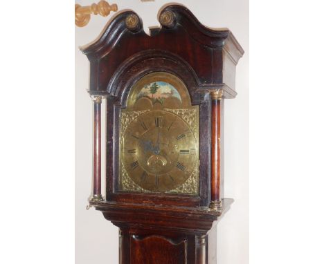 A George III period oak and mahogany Longcase Clock, the broken swan neck pediment above a 12" broken arch brass dial, the "r