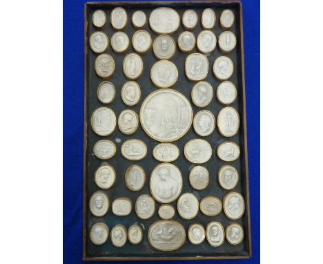 Approximately 52 19th Century Grand Tour Portrait style Intaglios within a frame, frame size 33cm x 21cm  CONDITION REPORT: S