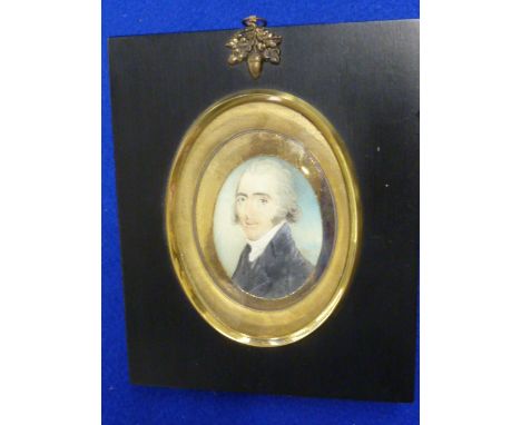 A 19th Century shoulder length Portrait Study of a young gentleman with white hair and black tunic, within an oval gilt frame