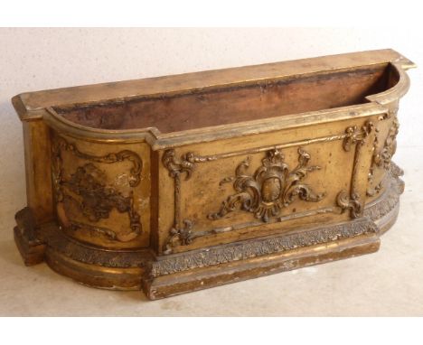 A 19th Century gilded breakfront Planter with applied decoration and moulding etc., above a plinth base, 111cm wide 