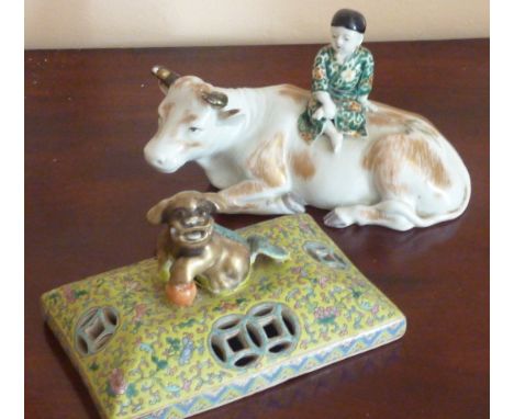 A late 19th Century Chinese porcelain model of a young boy seated upon the back of a recumbent ox and a 19th Century rectangu